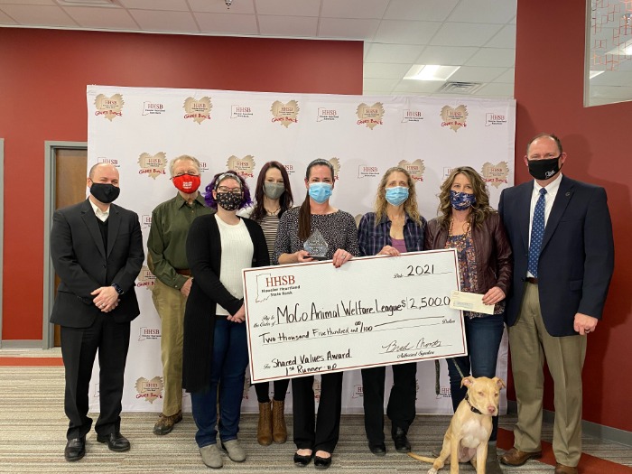 HHSB Team holding check