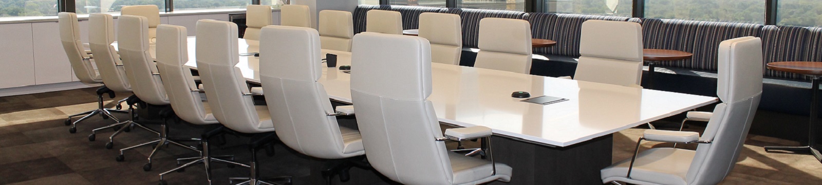 Boardroom with chairs and a table