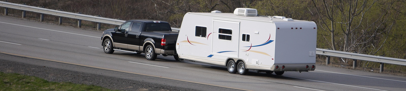 Pickup truck towing a camper
